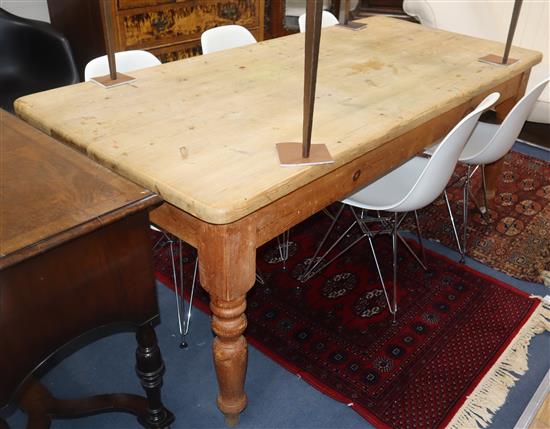 A Victorian style pine kitchen table L.180cm